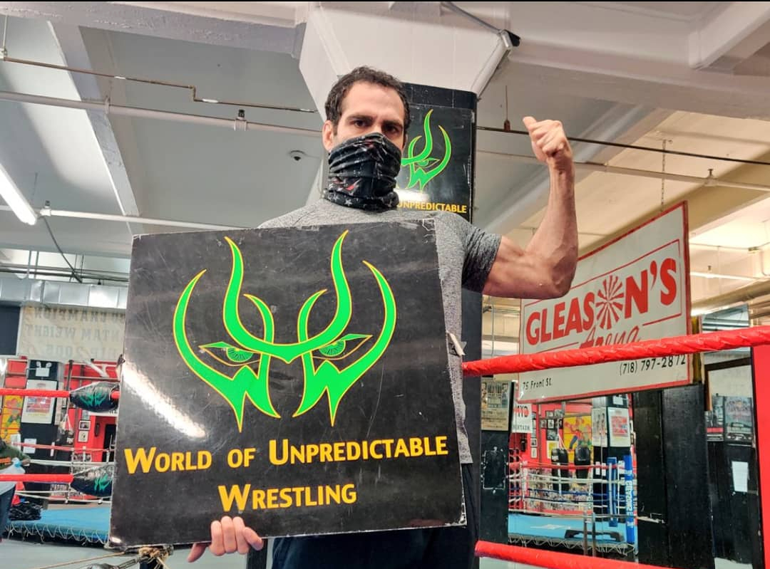 Israel Joffe representing WUW flexing his muscle